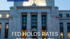 Fed Holds Rates Steady, Flags Uncertainty Over Iran War Impact