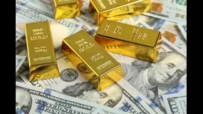 Gold Rebounds on Renewed Risk Aversion; Dollar Firms Amid Yield Volatility